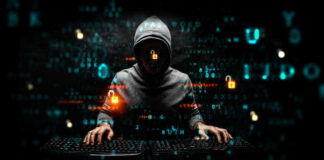 Hacker wearing a hoodie with digital codes overlaying