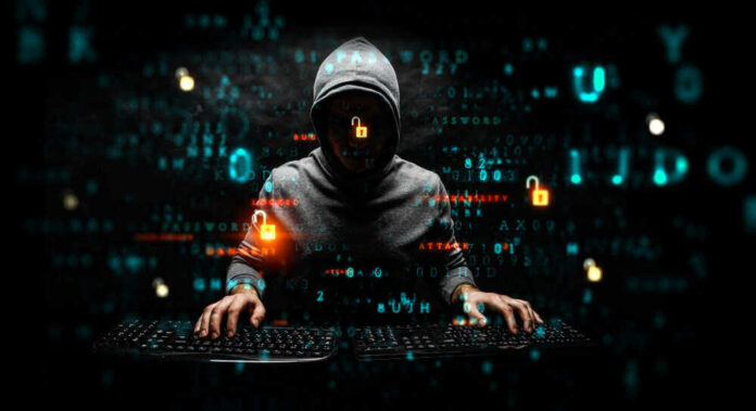 Hacker wearing a hoodie with digital codes overlaying