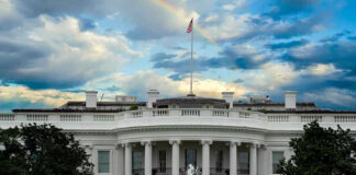 White House with a rainbow in the sky