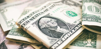 U.S. dollar bills with George Washington visible