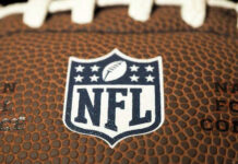 Close-up of NFL logo on American football