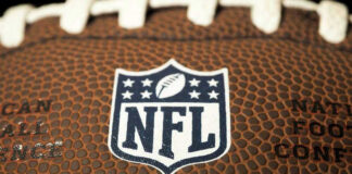 Close-up of NFL logo on American football