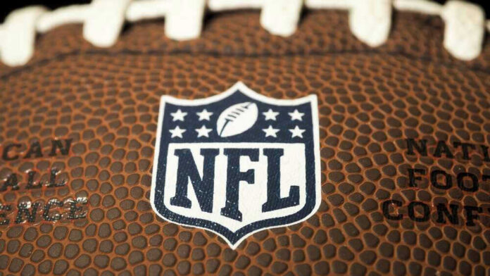 Close-up of NFL logo on American football