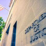 DOJ REMOVES Epstein Files – Trump Photos VANISH Department of Justice building with American flag.
