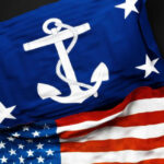 USA Navy and American flags together.