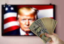 Hand holding cash in front of American flag background with Donald Trumps face