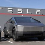 Tesla’s Shocking Change — No One Saw THIS Coming! Tesla Cybertruck parked in front of a Tesla dealership
