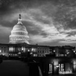 U.S. Capitol building at dusk, black and white photograph.