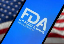 FDA’s Weight-Loss Pill Block FDA logo on smartphone American flag background
