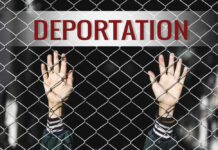 MASSIVE Deportation Numbers EXPOSED Hands reaching through a chain-link fence with the word 'DEPORTATION' above