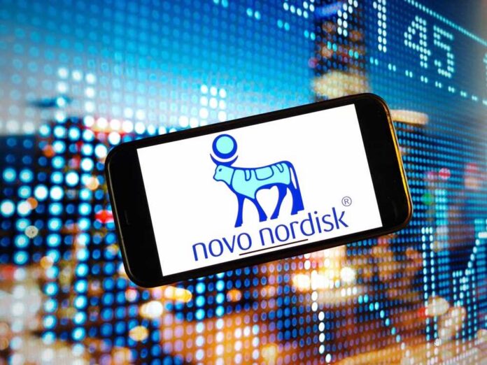 Smartphone displaying the Novo Nordisk logo against a colorful digital background
