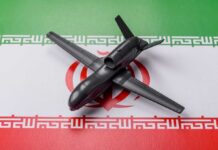 A model drone placed on the Iranian flag