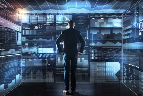 A businessman analyzing data on a digital interface