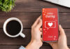 Person holding a smartphone displaying an online dating app