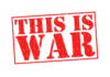 A bold red stamp with the text 'THIS IS WAR'