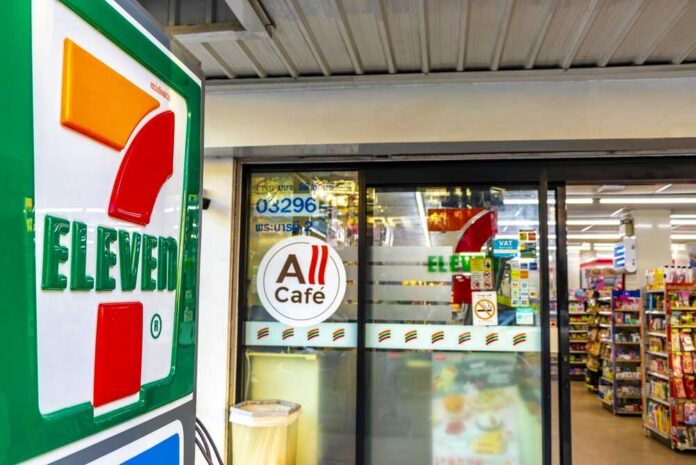Exterior view of a 7-Eleven convenience store with All Cafe signage