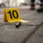 Teen Shooters’ Motive: Racial Pride Note Alleged Bullet casing on the ground next to a numbered evidence marker