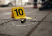 Teen Shooters’ Motive: Racial Pride Note Alleged Bullet casing on the ground next to a numbered evidence marker