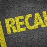 Bad Ingredient Triggers Nationwide Recall Yellow 'RECALL' text on a dark asphalt surface