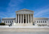 Mail-Order Abortion Suddenly BANNED — Supreme Court Intervenes U.S. Supreme Court building under clear blue sky.