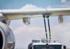 THIS Name Triggers Midair PANIC Close-up of an airplane wing being fueled by a ground support truck