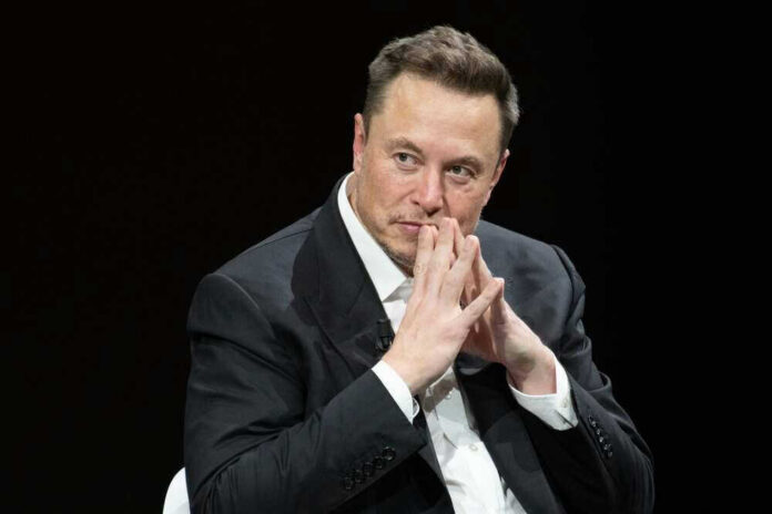 shutterstock_23188002871 Elon Musk in suit thinking.