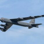 VIDEO: Fireball As B-52 Crashes — Eight Gone B-52 bomber flying against a blue sky
