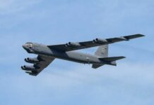 VIDEO: Fireball As B-52 Crashes — Eight Gone B-52 bomber flying against a blue sky
