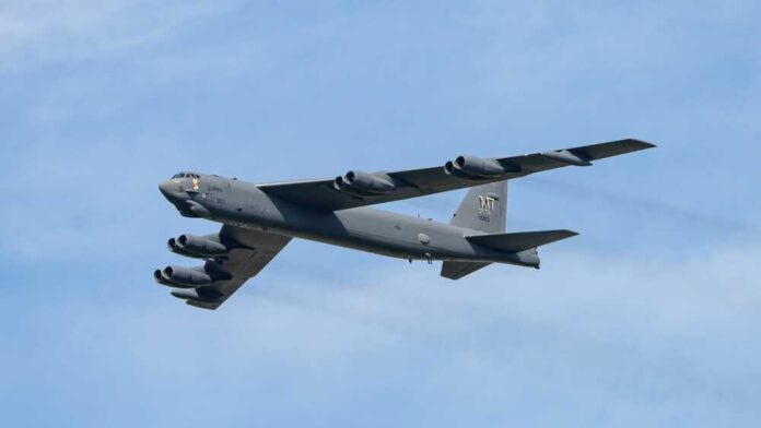 Zeltweg,,Styria,,Austria,-,09,03,2022:,A,B-52,Stratofortress B-52 bomber flying against a blue sky