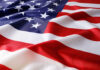 Confirmation Brawl Explodes Over Spy Chief American flag with stars and stripes in close-up