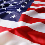 Confirmation Brawl Explodes Over Spy Chief American flag with stars and stripes in close-up
