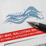Trump Seeks Supreme Control Over Mail Ballots Vote-by-mail envelope with pen on top.