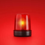 Deadly Mist Haunts Upper East Side Red emergency light on red background