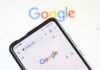 NOW: Google Smacked — Billion-Dollar Blow Smartphone displaying the Google homepage