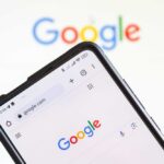 NOW: Google Smacked — Billion-Dollar Blow Smartphone displaying the Google homepage