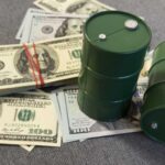 Oil Whiplash: Billions Given, Then Yanked Green oil barrels on US dollar bills