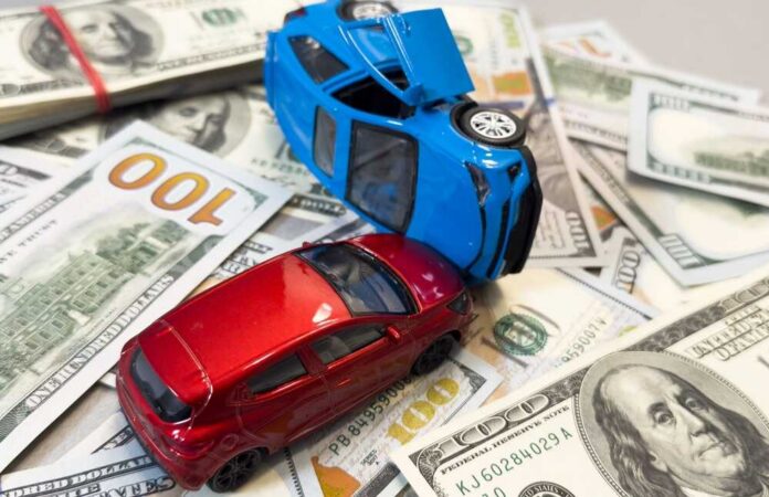 Toy,Cars,In,Accident,On,A,Background,Of,100,Dollar
