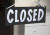 Iconic Candy Giant Abandons New Jersey A black sign with the word 'CLOSED' painted in white letters