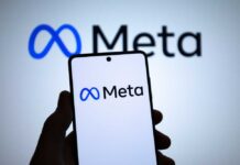 Meta’s $18B Wake-Up Call Smartphone displaying a blue infinity logo with matching logo on screen behind