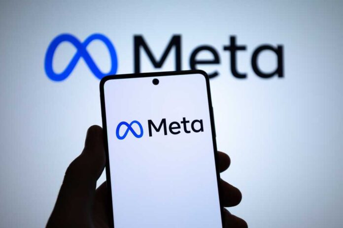 Smartphone displaying a blue infinity logo with matching logo on screen behind