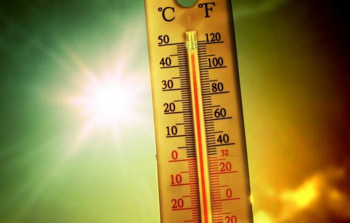Thermometer,Over,38,Degrees,Heat,Wave Thermometer displaying high temperature against a bright sun