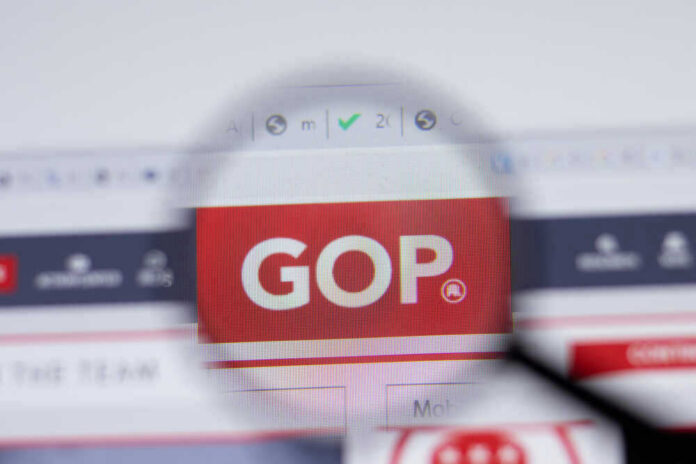 shutterstock_1924605617 Magnifying glass focusing on GOP website logo.