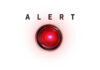 ALERT: Luxury SUVs Go Dark Mid-Drive A red alert button with the word 'ALERT' above it