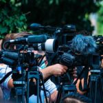 Trump’s Name On Mailbox Brings Massive Bump TV news cameras crowding together at an outdoor event