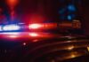 Close-up of a police car's emergency lights at night