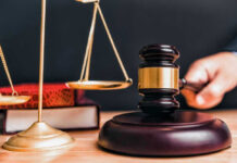 Court Smacks Down THIS Map — Voters Take Control Judge gavel, scales of justice, and law books.