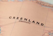 Trump’s Arctic Power Grab Stuns Rivals Close-up of a map showing Greenland labeled as Denmark