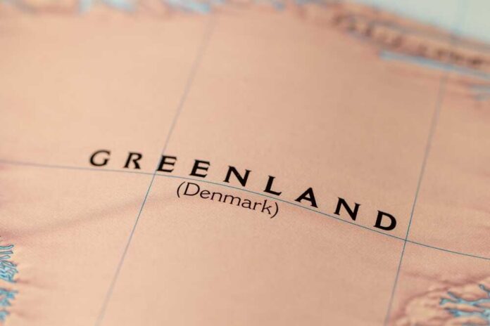 Close-up,Of,A,Map,Showing,Greenland,With,Denmark,Annotation Close-up of a map showing Greenland labeled as Denmark