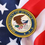 Department of Justice seal on American flag.