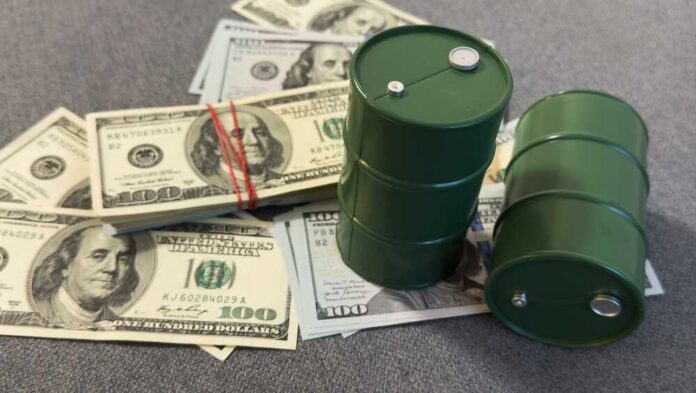 Spilled,Oil,From,A,Barrel,To,A,Dollar,Bill,Of Green oil barrels on US dollar bills